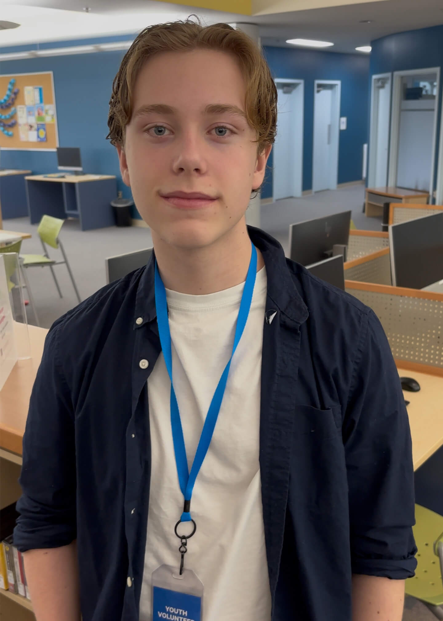 Jack wearing a youth volunteer lanyard at Tantallon Public Library